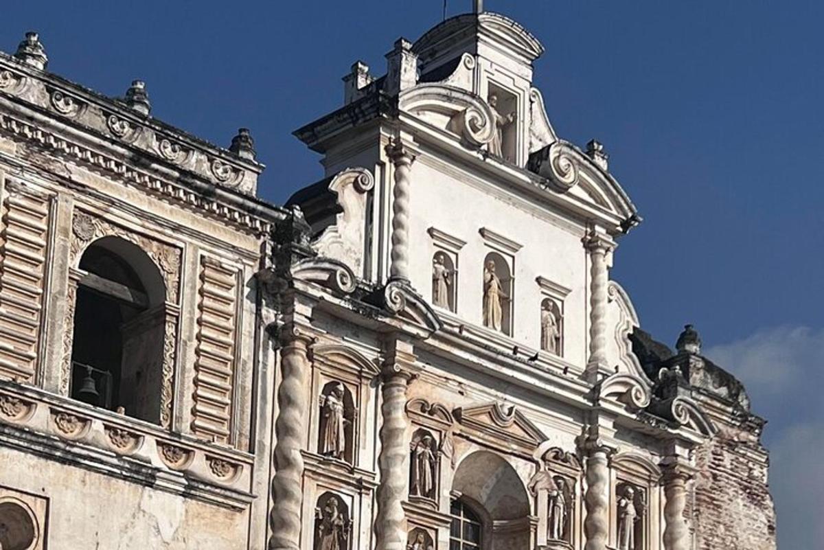 an old building with a tower on top of it
