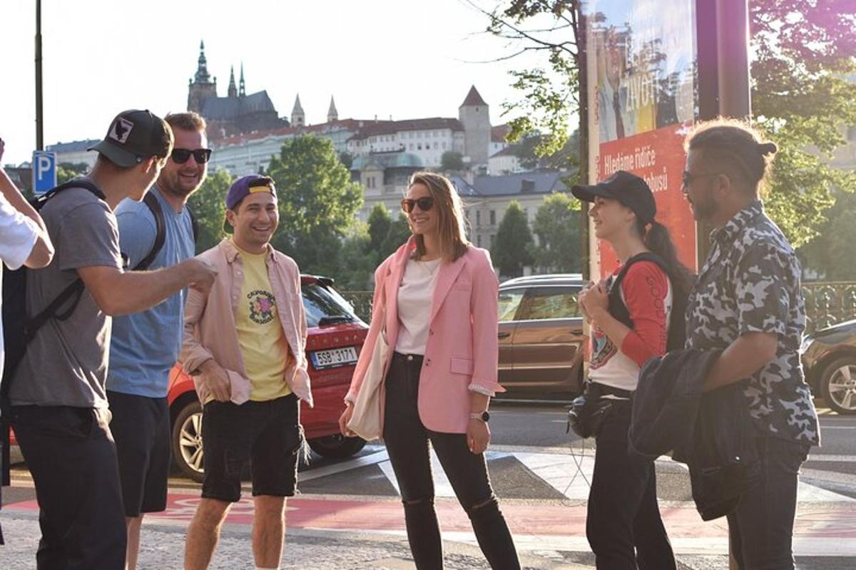 a group of people waiting to cross a street