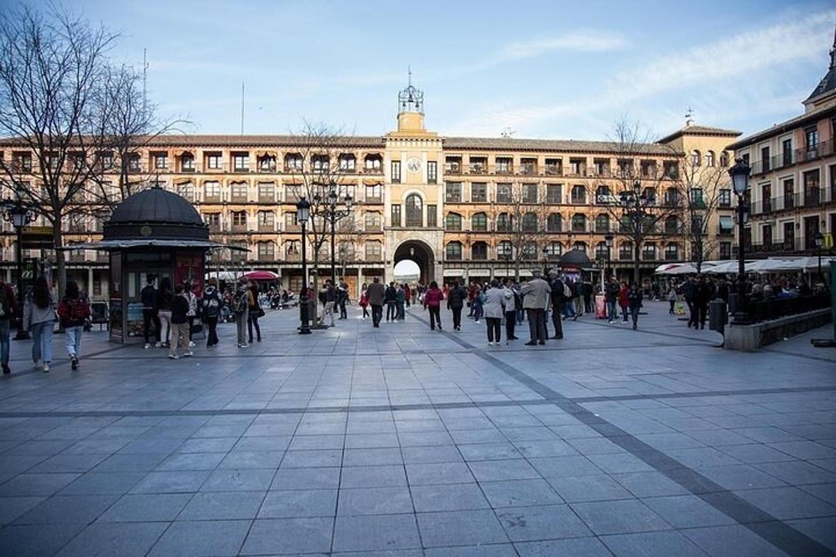 a large building with people walking in front of it
