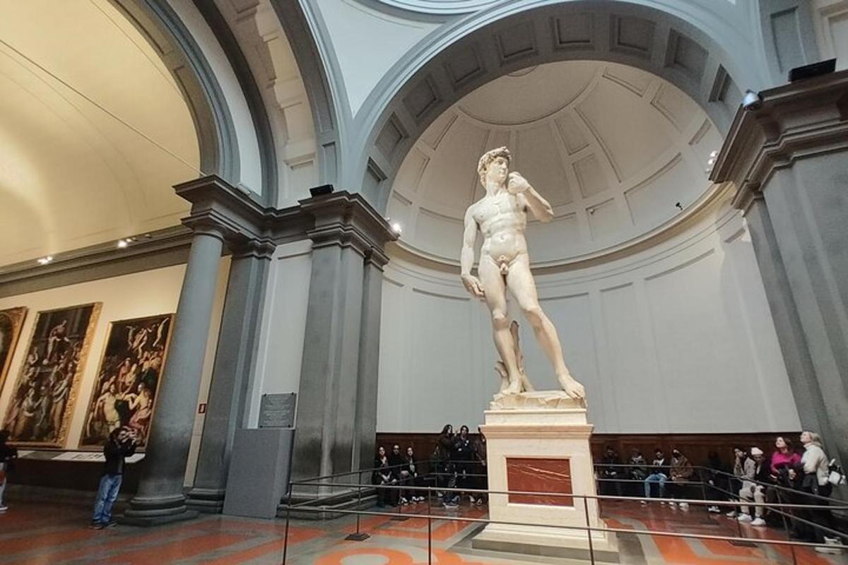 a statue of a man in a museum