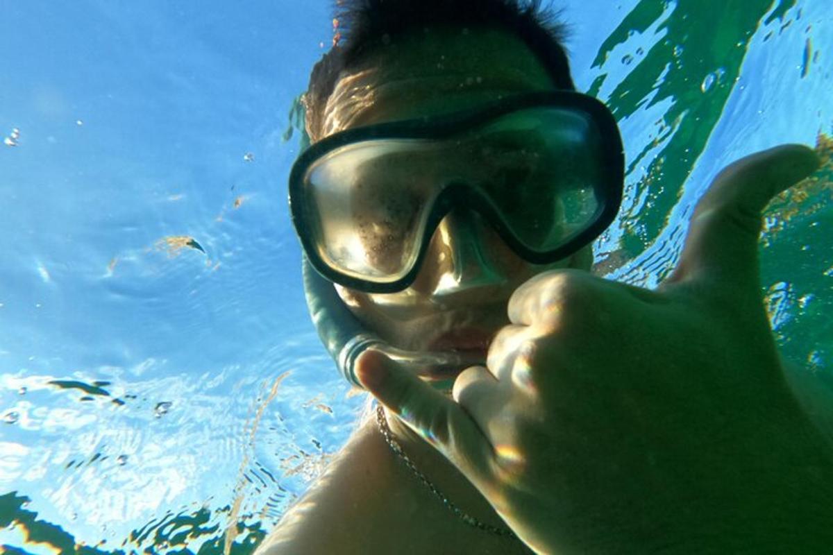 a person wearing a mask in the water