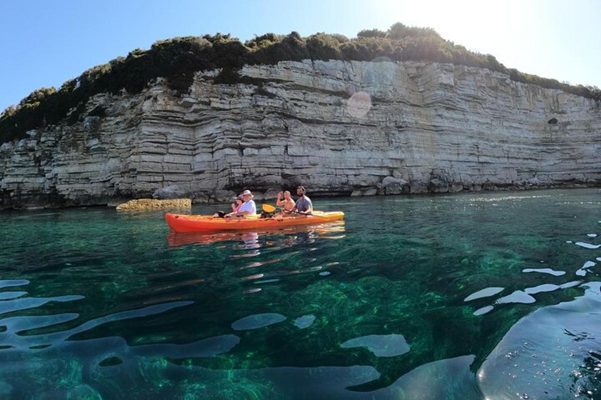 a group of people in a canoe in the water