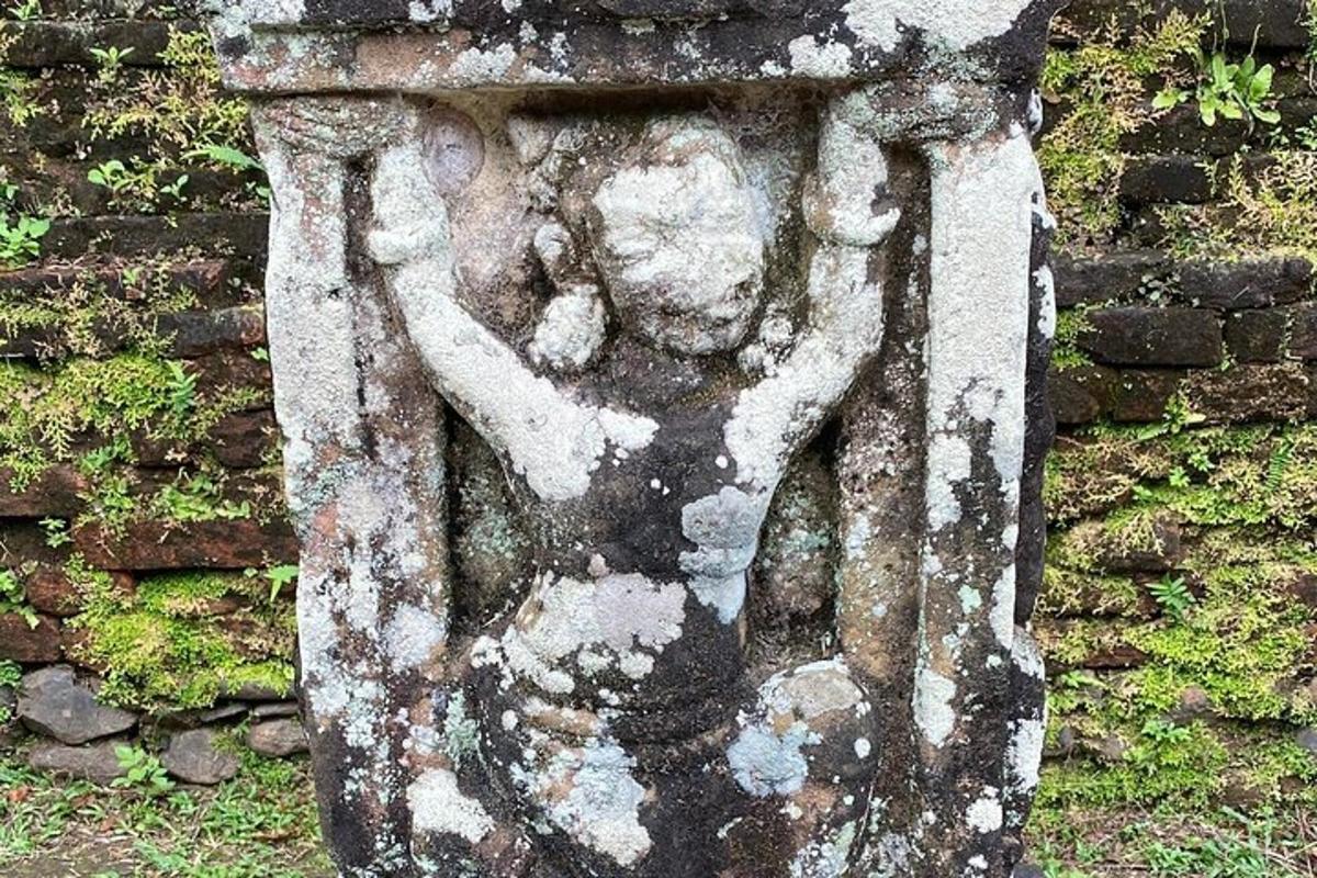 a statue of a woman on a fire hydrant