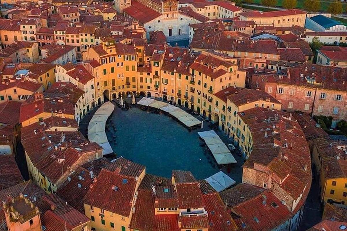 an aerial view of a city with a bridge
