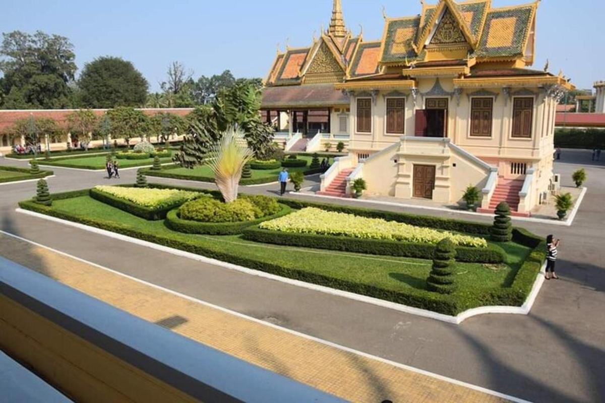 Una representación de una casa con un jardín delante de ella.