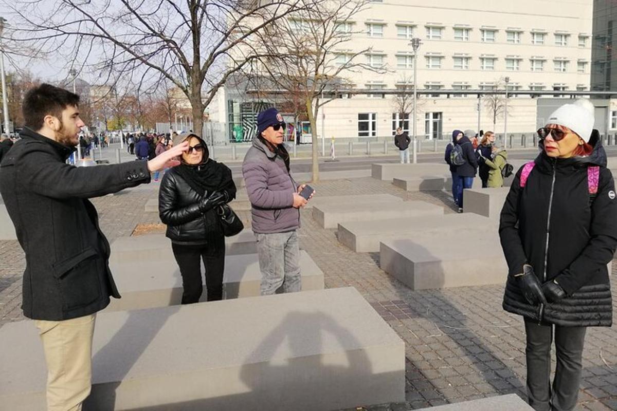 a man taking a picture of a group of people