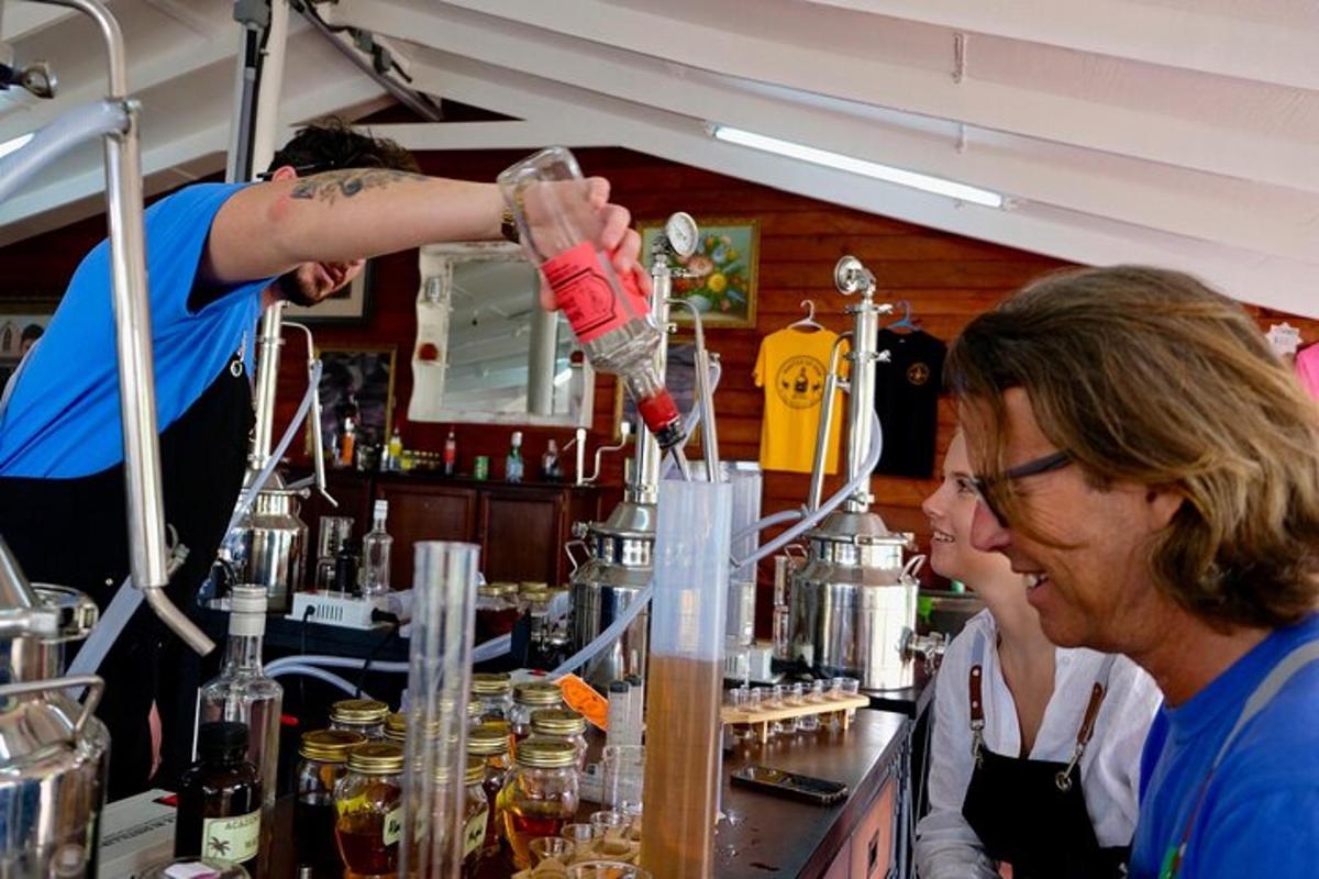 a woman standing behind a counter at a bartender