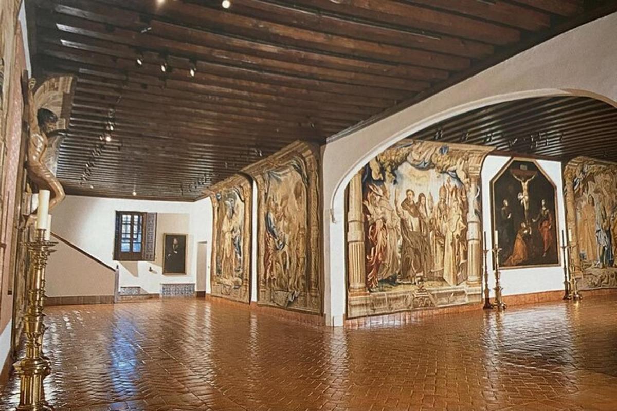 a large room with paintings on the walls