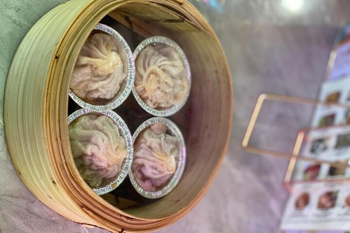a wooden bowl filled with food inside of it