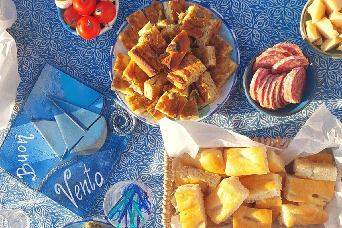 a table with two plates of bread and pastries