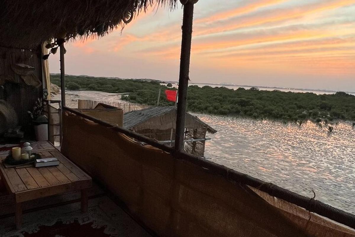 a porch of a house with a view of the water