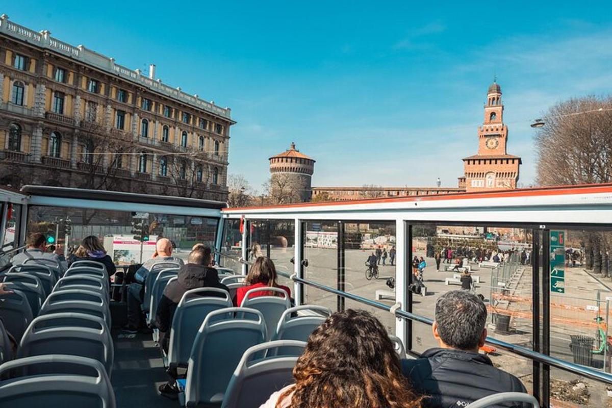 people sitting on a bus in the city