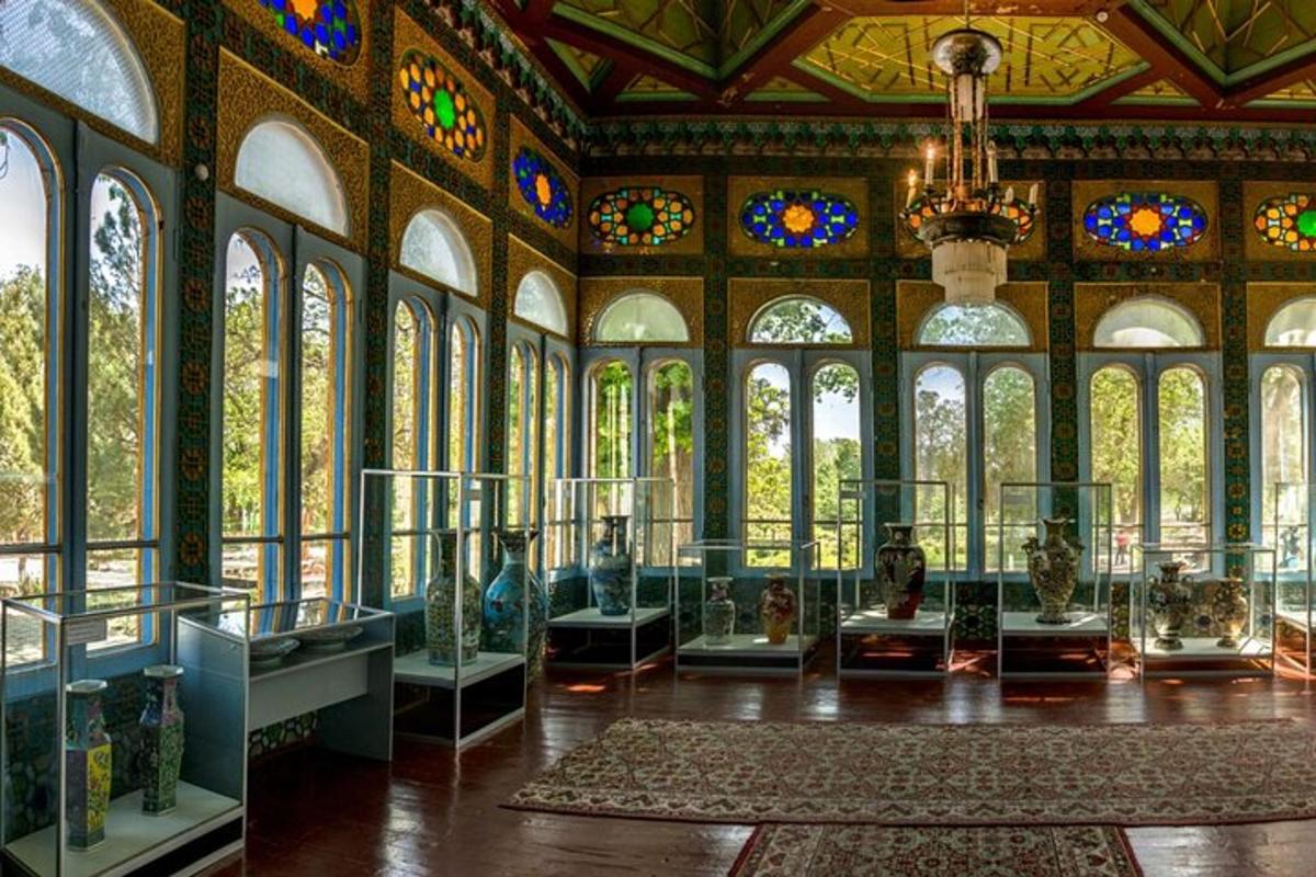 a large room with a bunch of vases on display