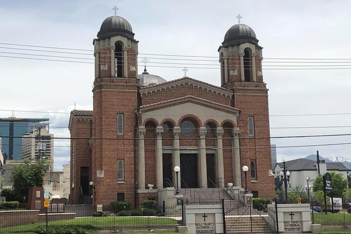 a large brick building with two domes on top