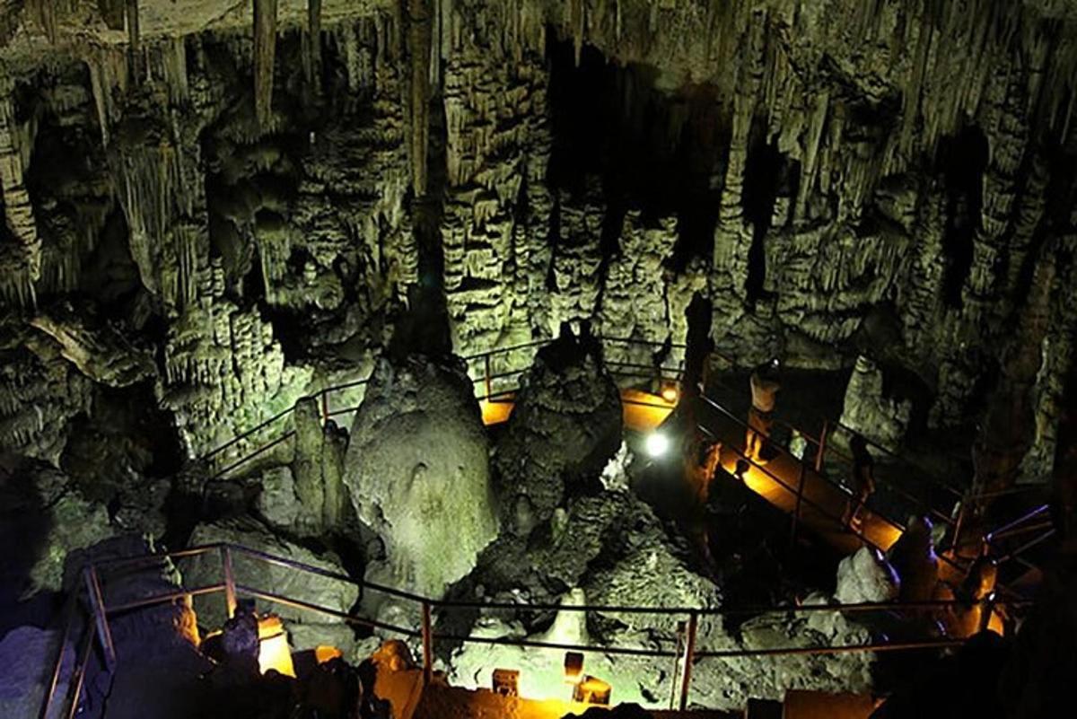 a view of a cave with people inside of it