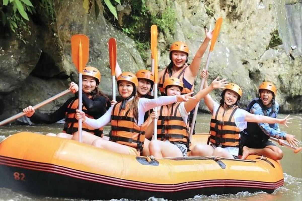 a group of people in a raft on a river