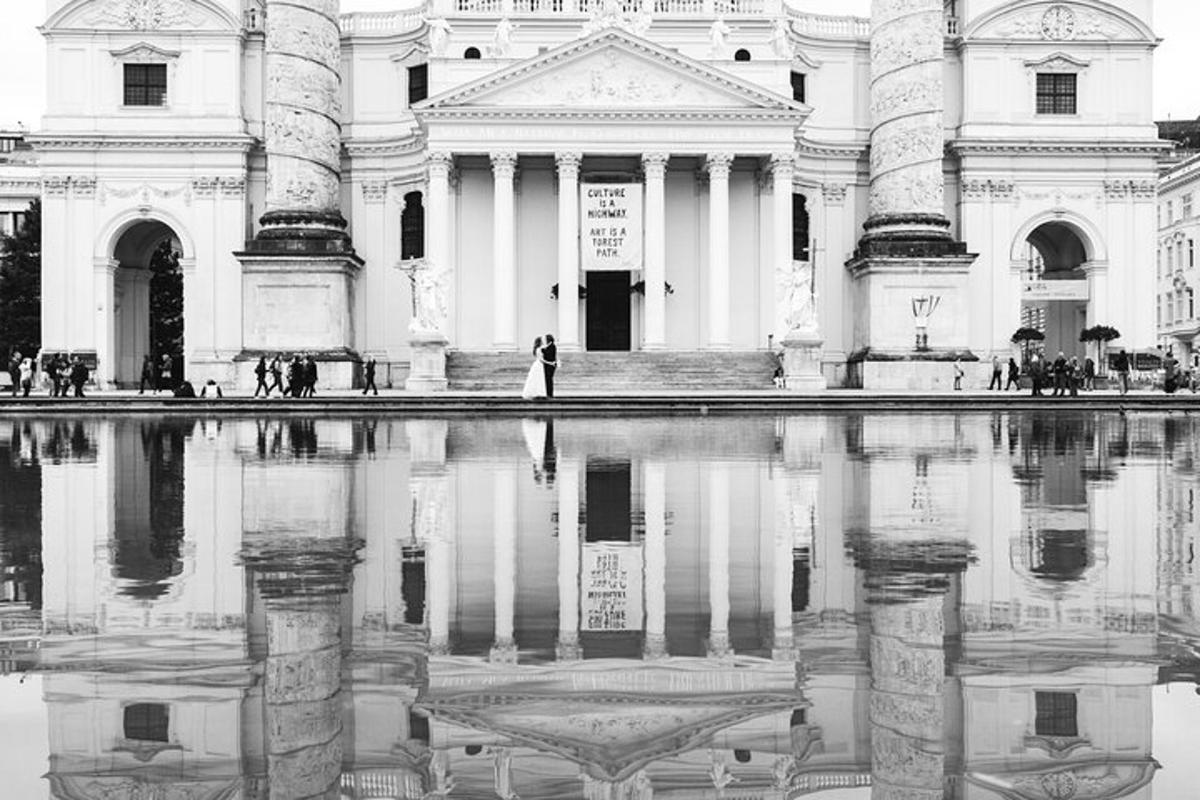 a black and white photo of a building with a reflecting pool