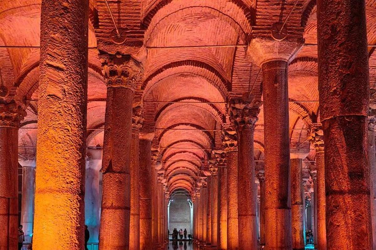 a large room with columns and ceilings in a building