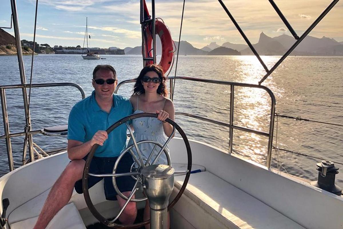 a man and a woman sitting on a boat