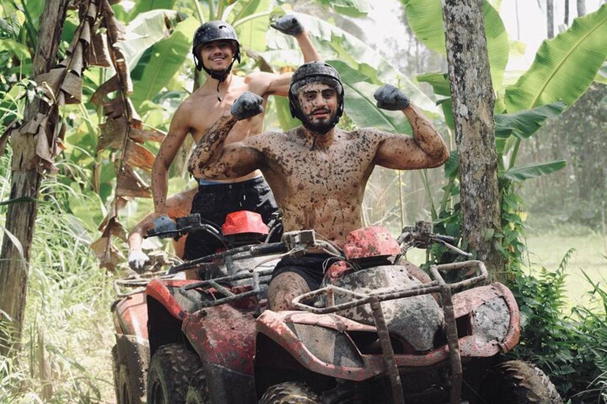 two men riding on dirt bikes in the forest