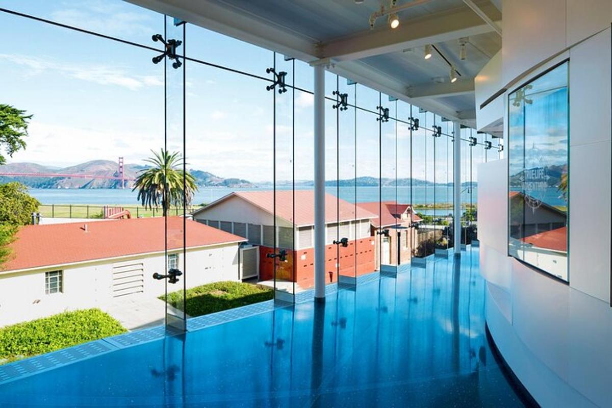a room with a view of a building with glass windows