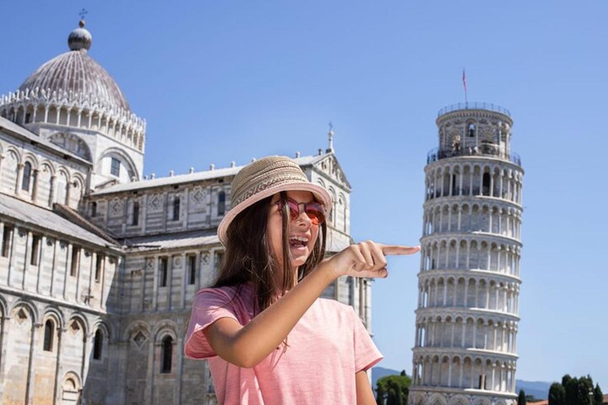 a girl pointing at the leaning tower of pisa