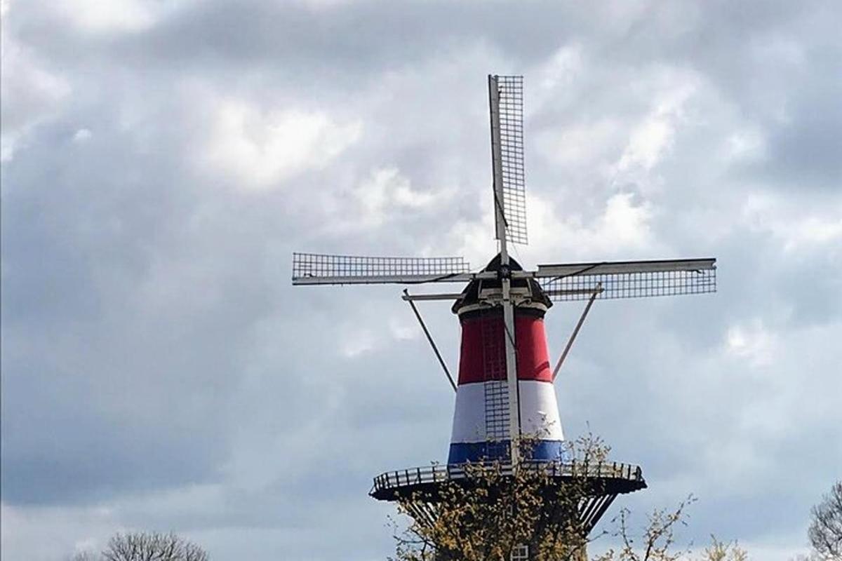 a windmill with a red white and blue