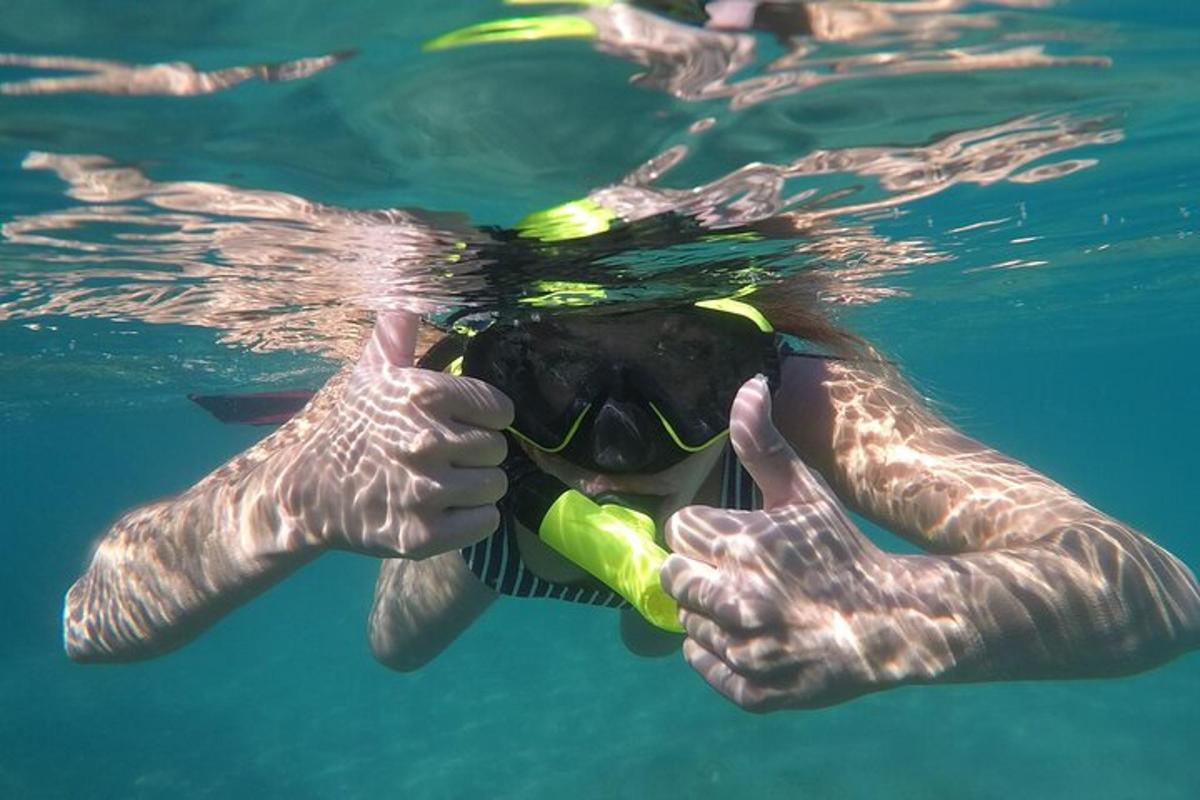 a person in the water with aqual