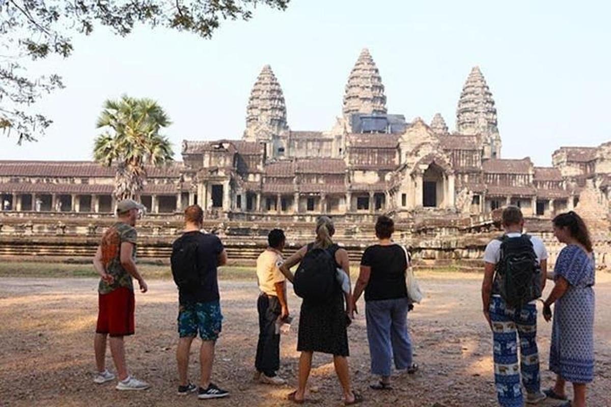 a group of people standing in front of a building