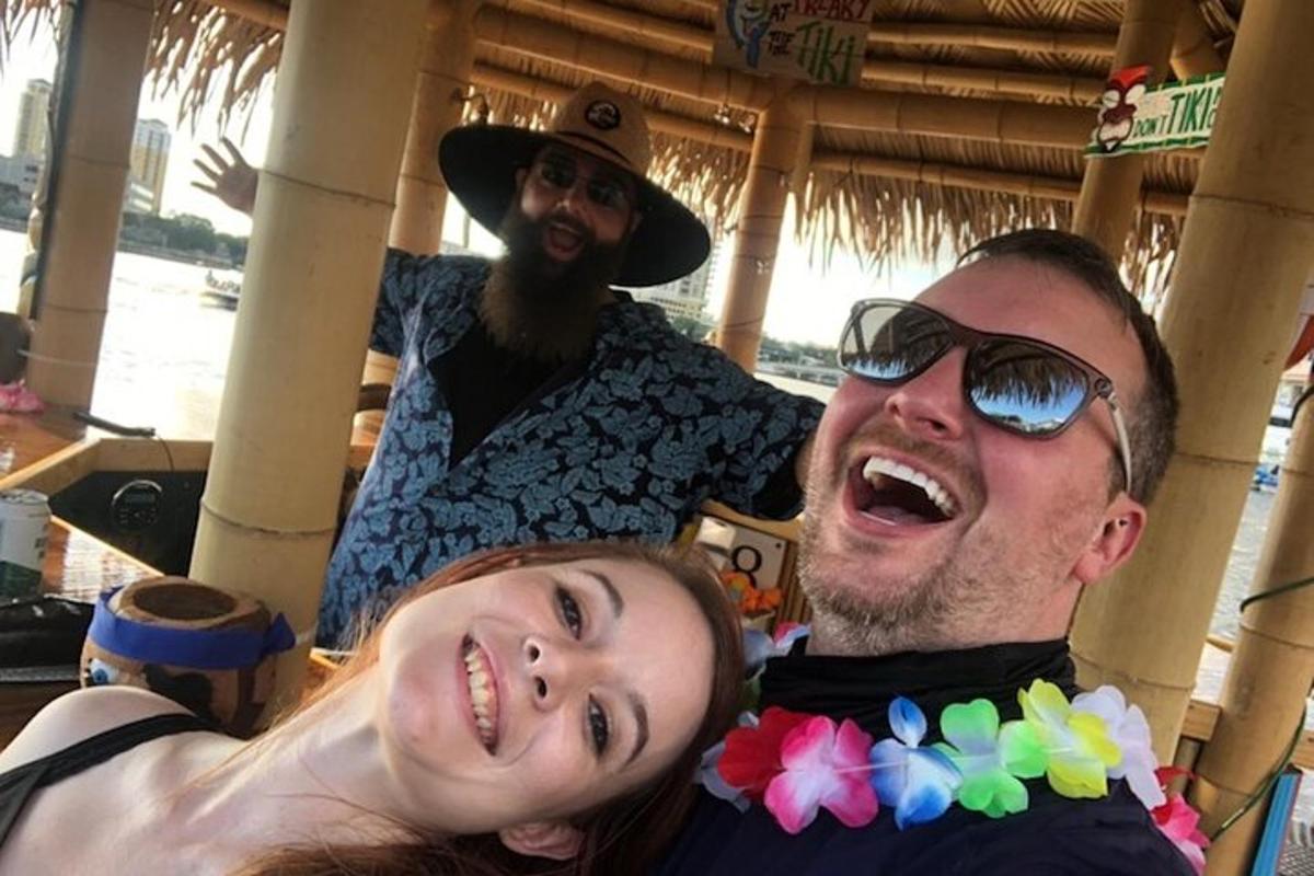 a man and a woman are posing for a picture