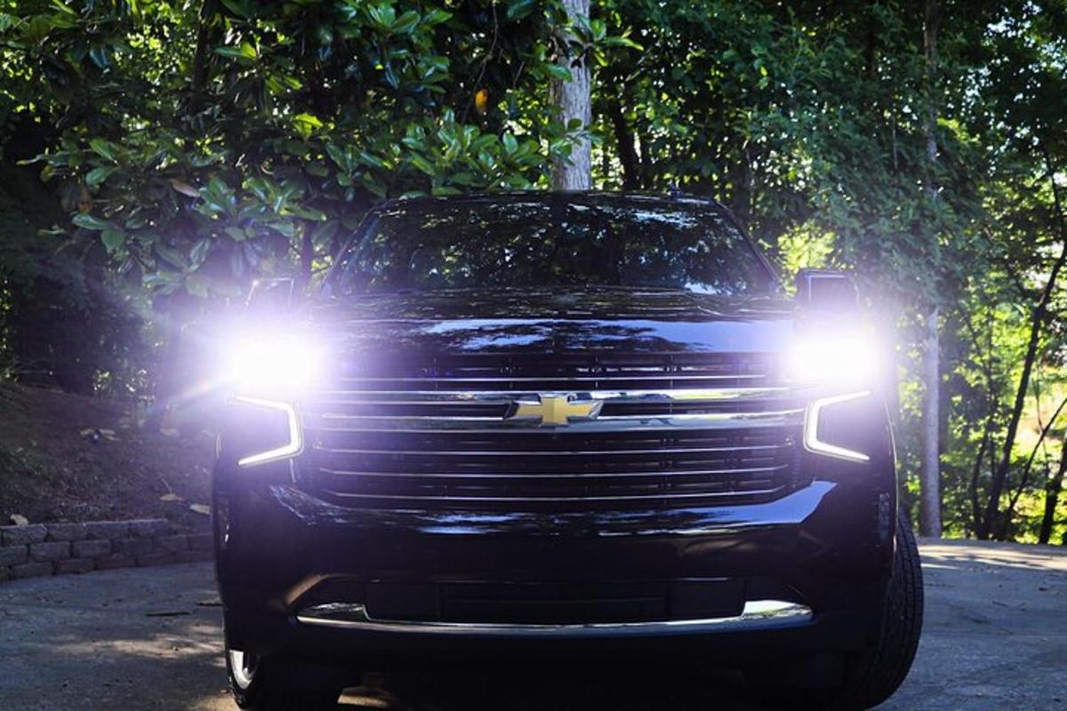 a black truck with its headlights on