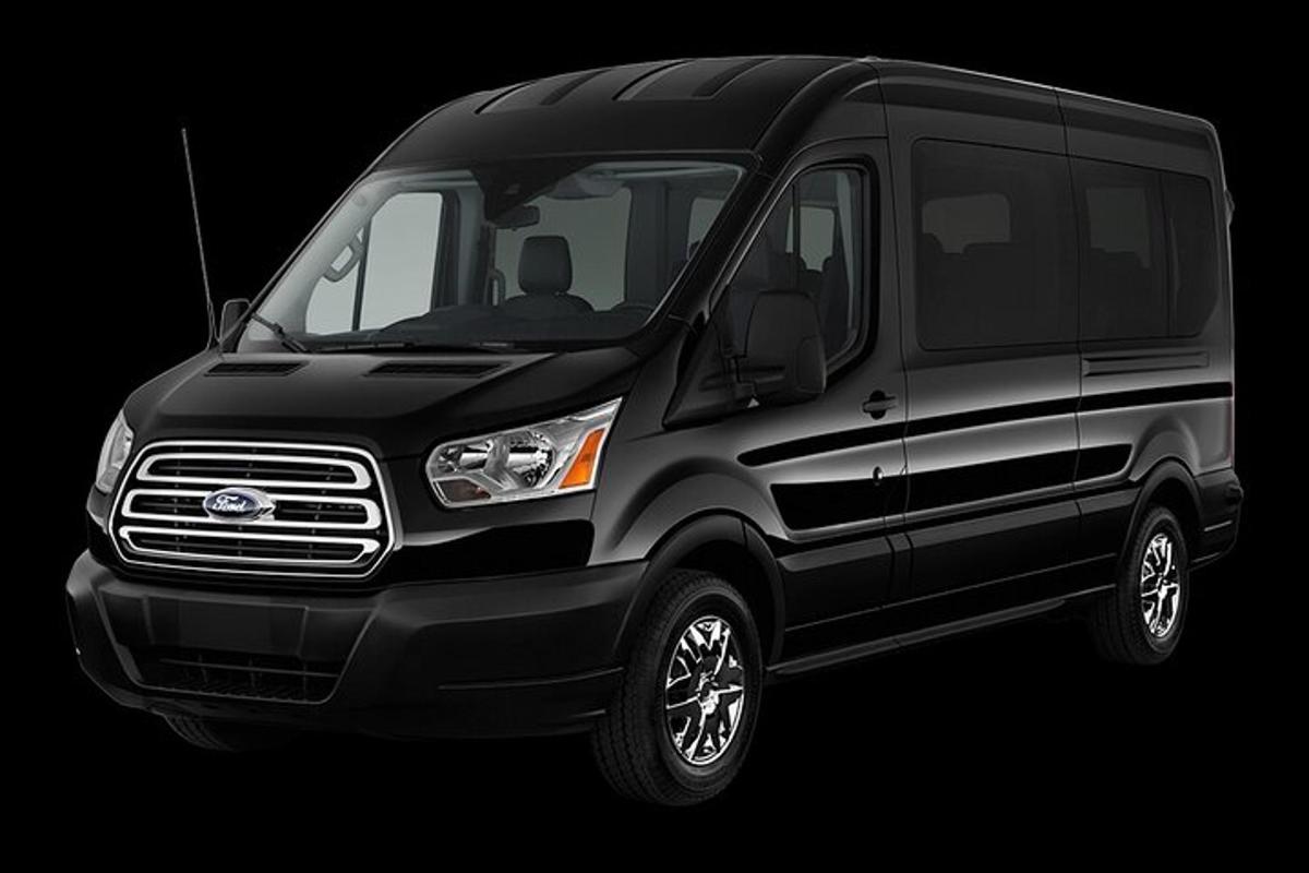 a black van parked in a black background
