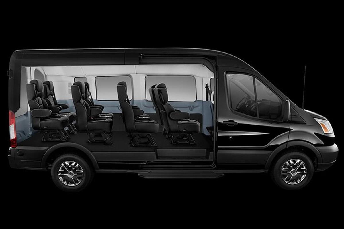 a black van with four seats on a black background