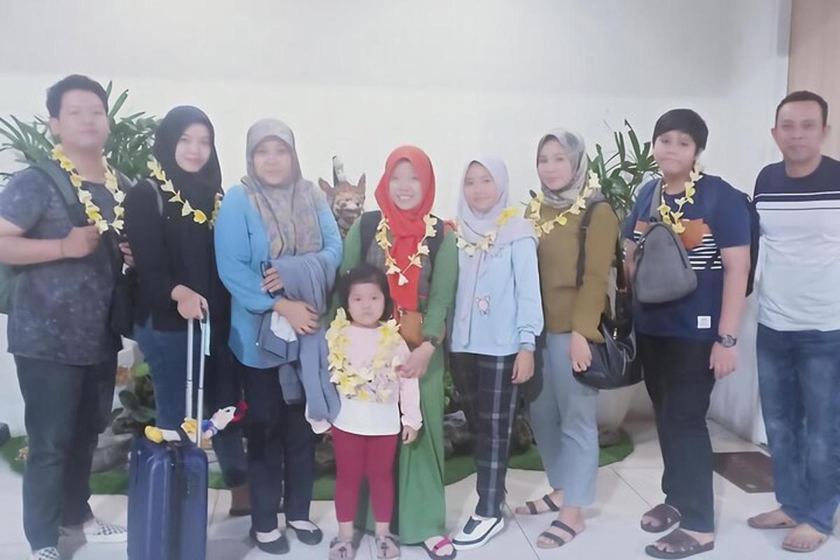 a group of people posing for a picture