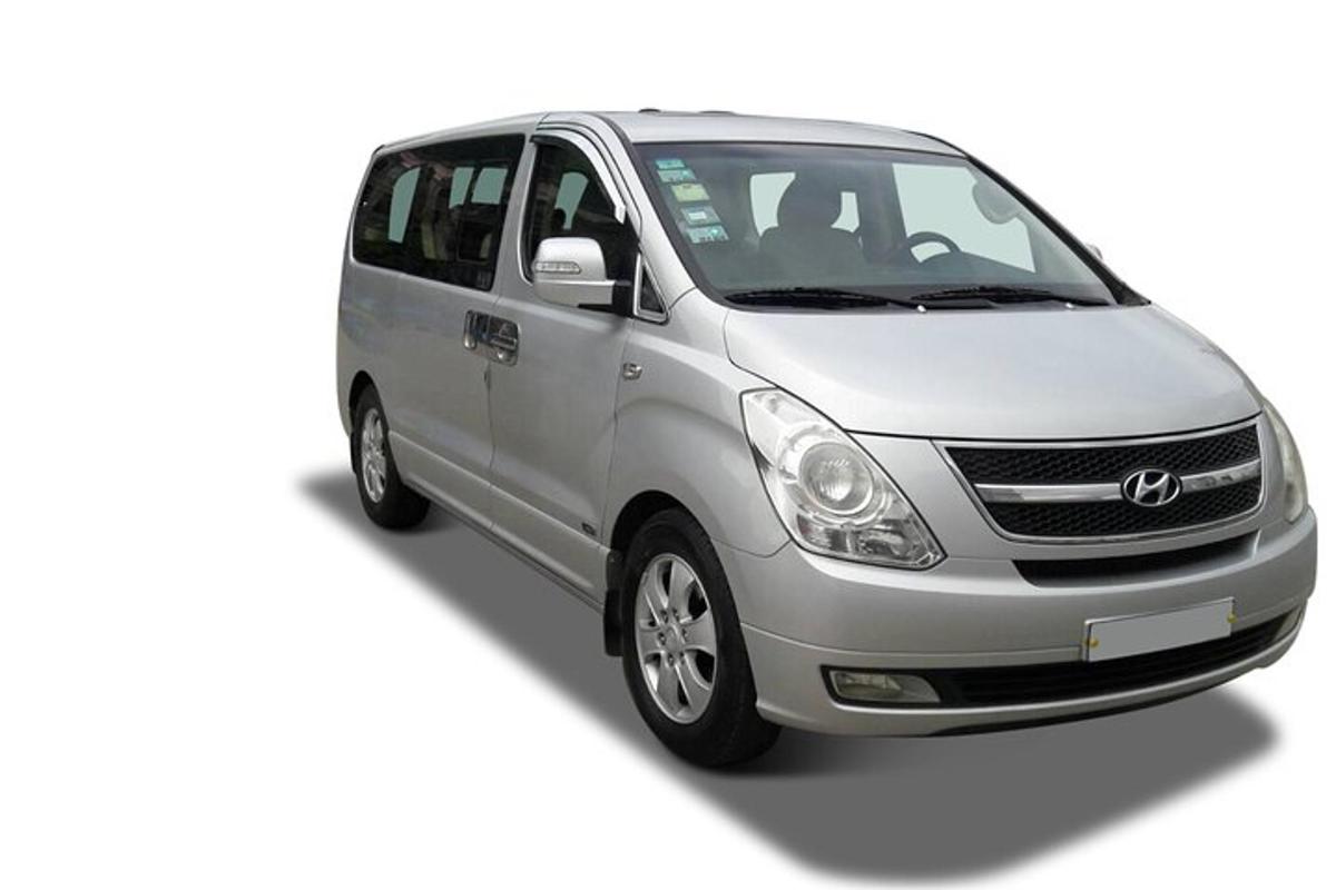 a silver minibus isolated on a white background