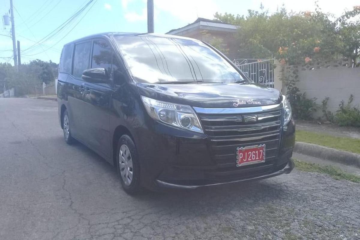 a black van parked on the side of a street