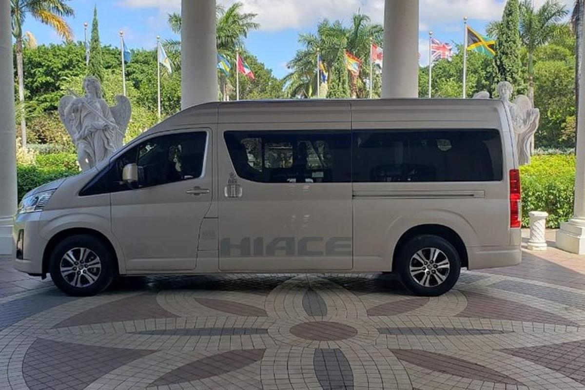 a white van parked in front of a building