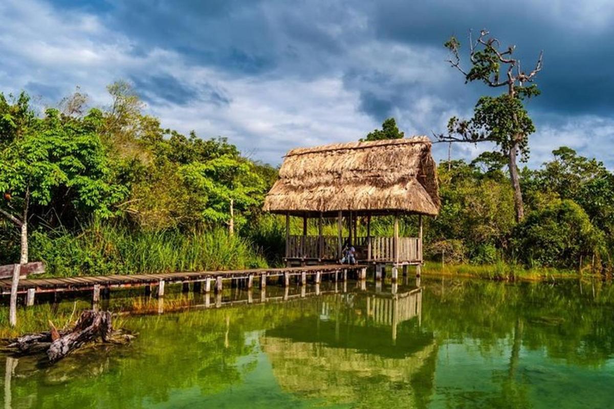 a hut in the middle of a body of water