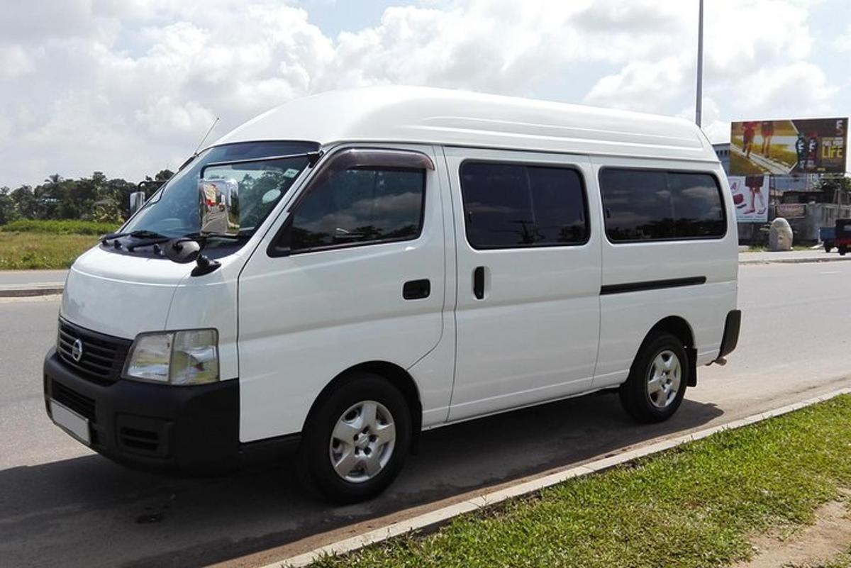 a white van parked on the side of a road