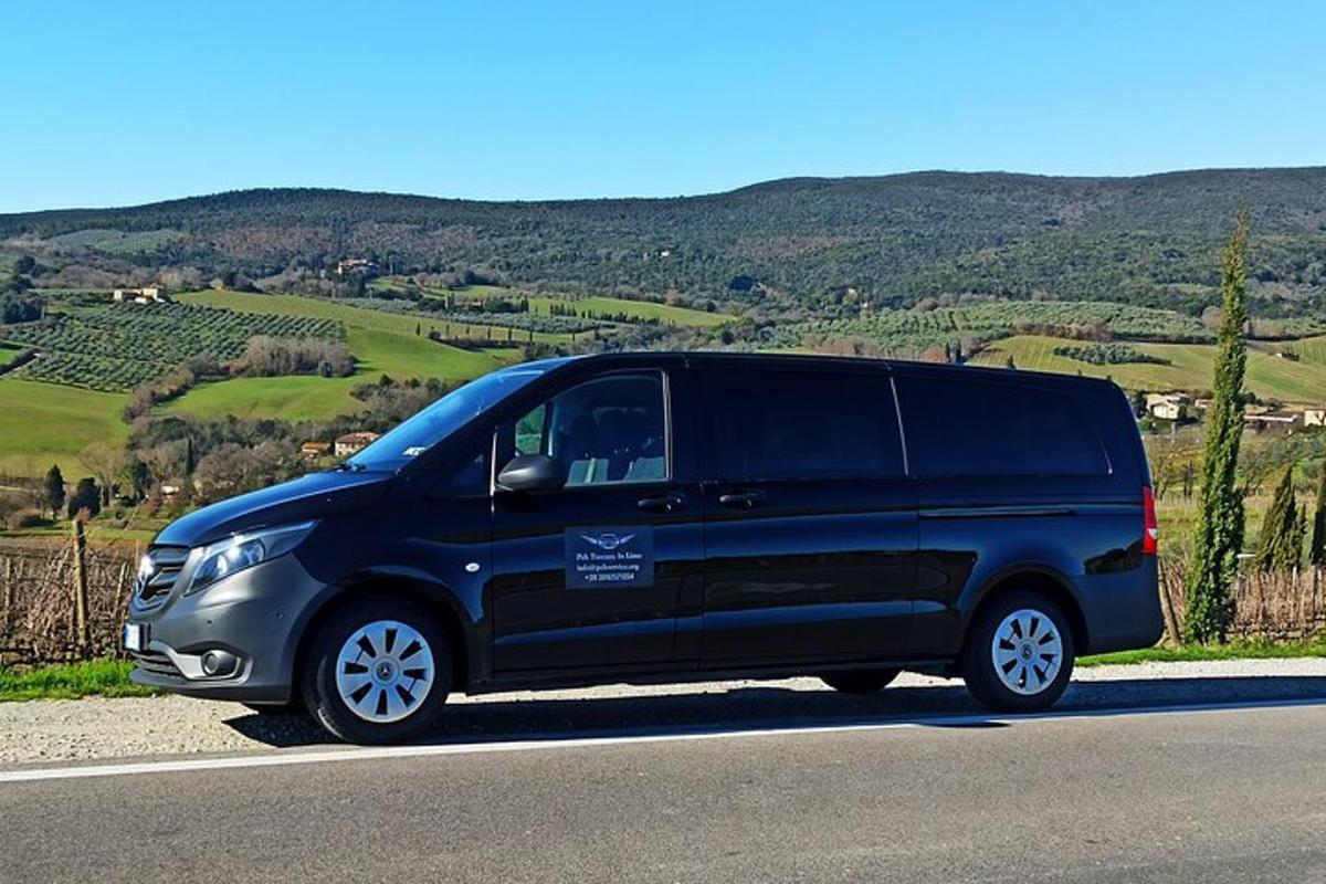 a black van parked on the side of a road