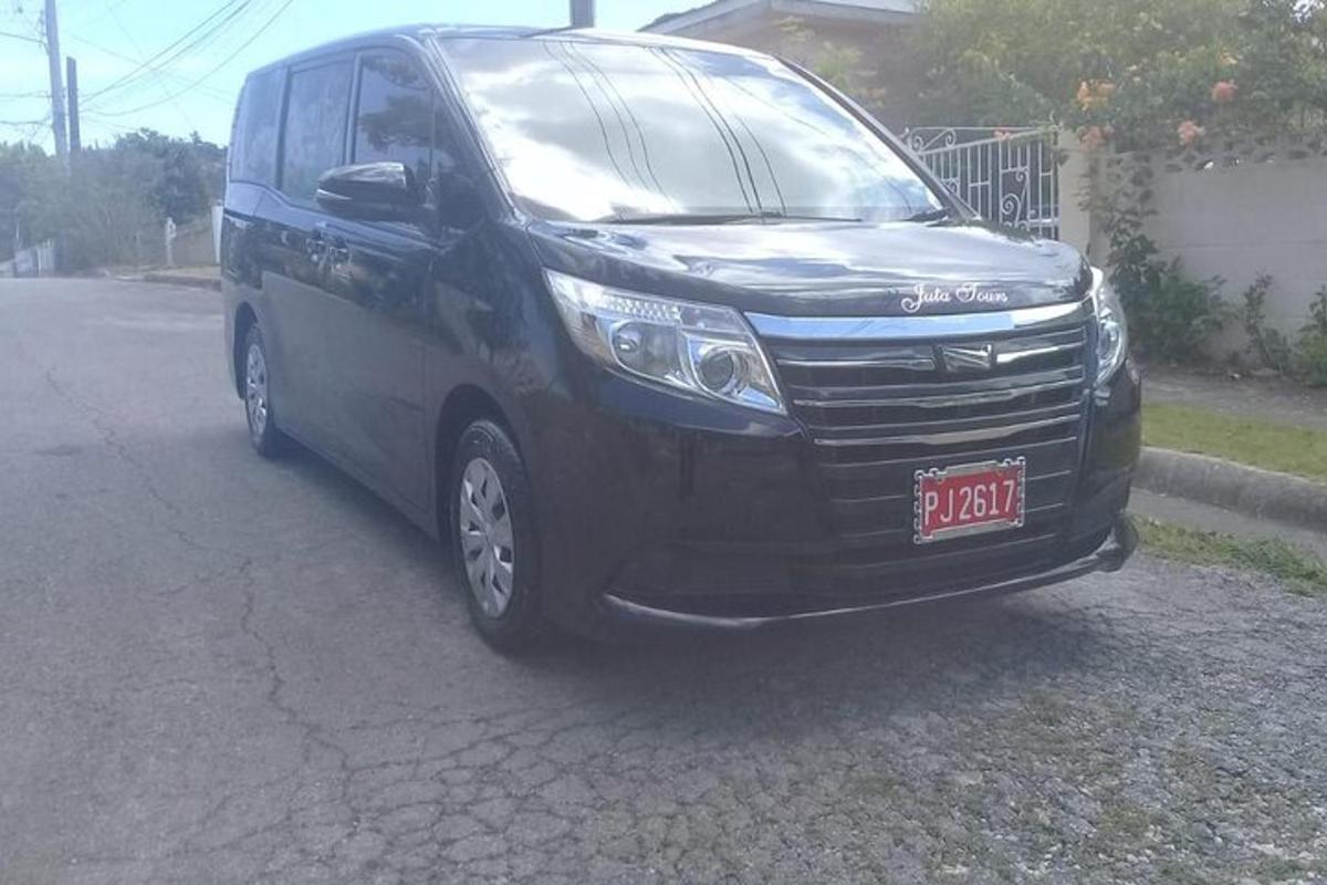 a black van is parked on a street
