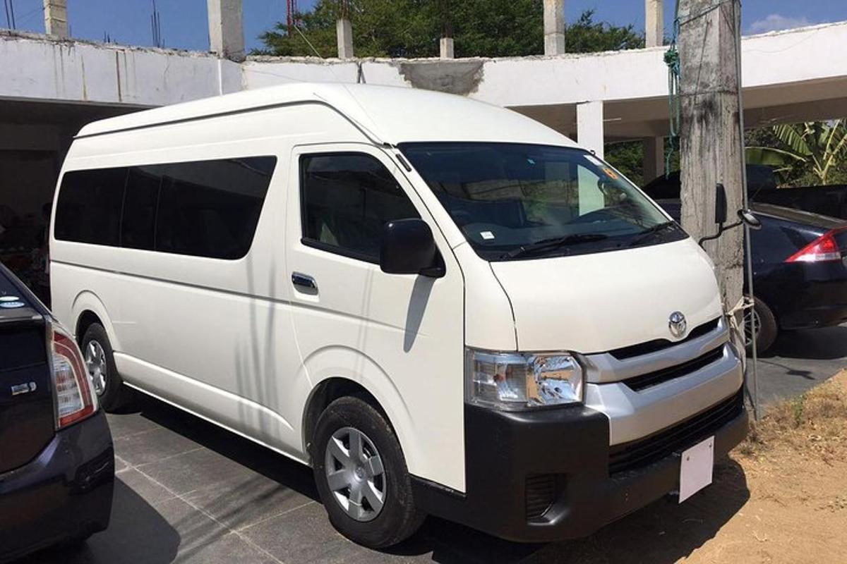 a white van parked in a parking lot