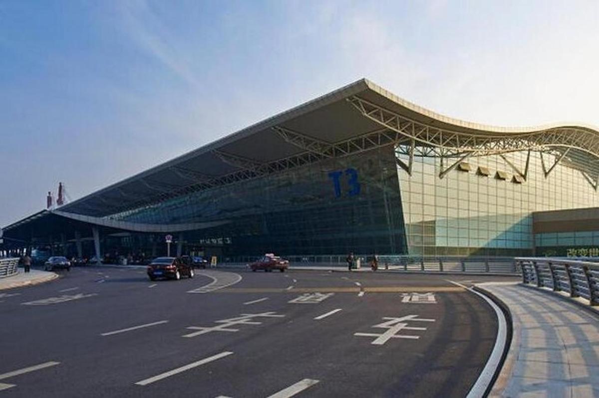 a large building with a road in front of it