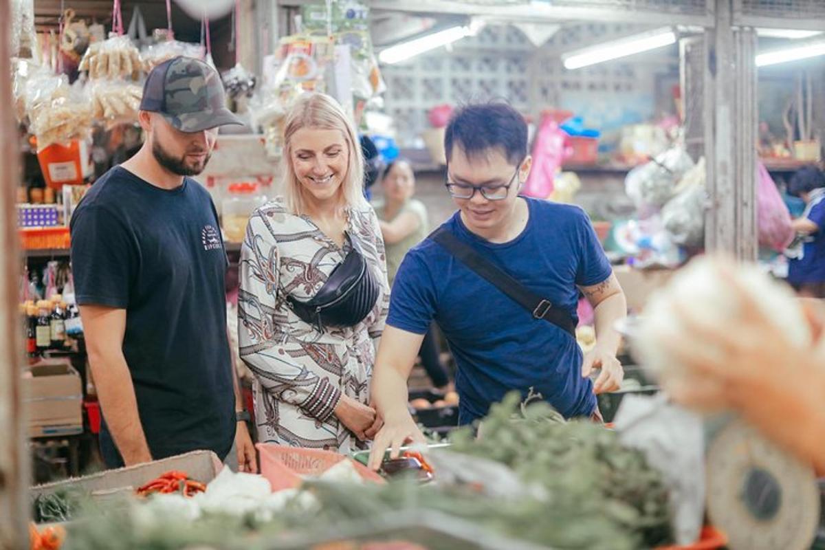 a group of people standing in a grocery store