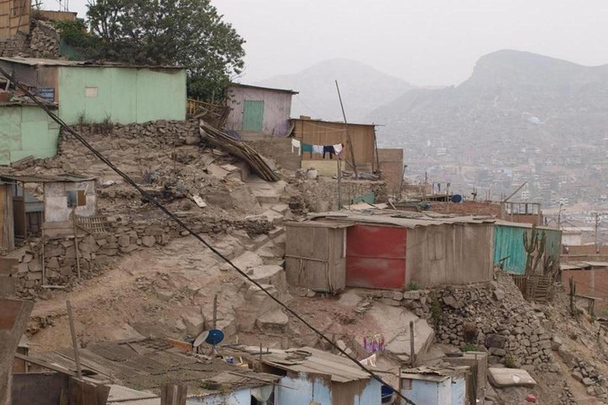 a hillside with houses on top of a mountain