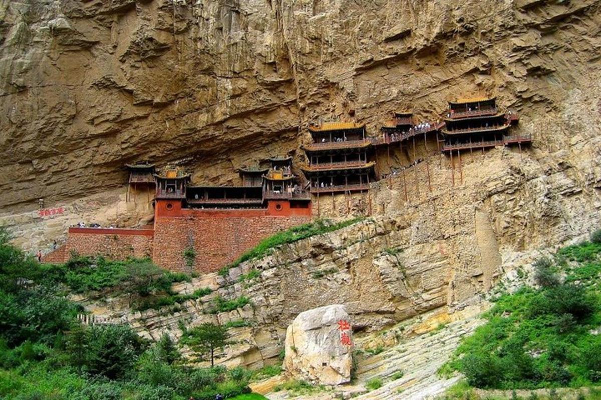 a building on the side of a mountain
