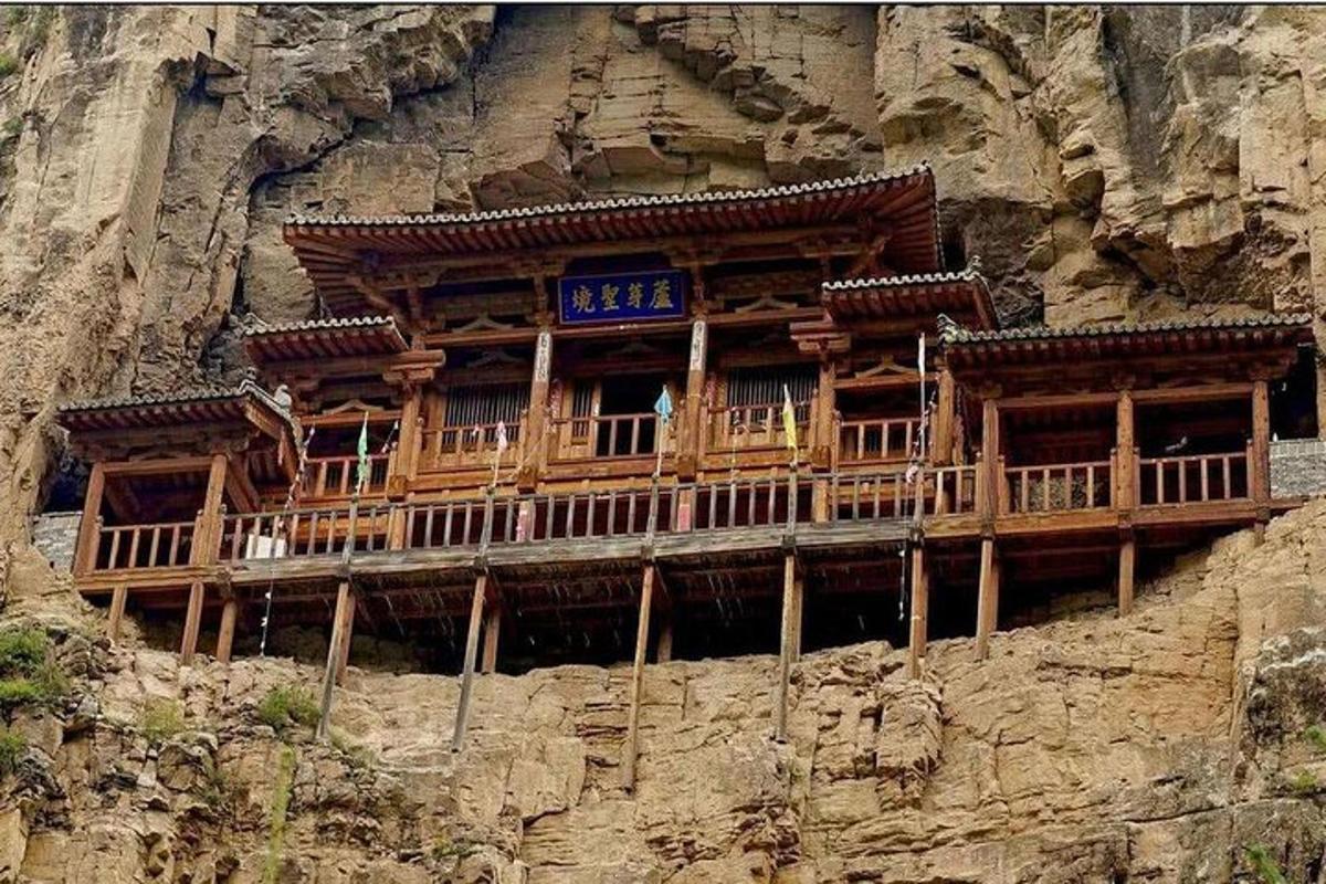 a building on the side of a mountain