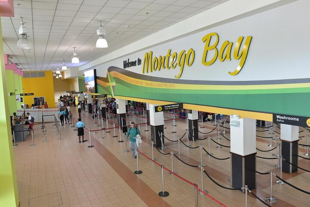 a mall with a marmite bay sign and people walking around