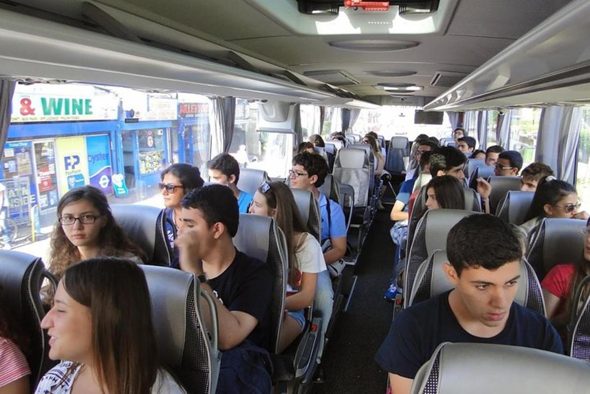 a group of people sitting on a bus