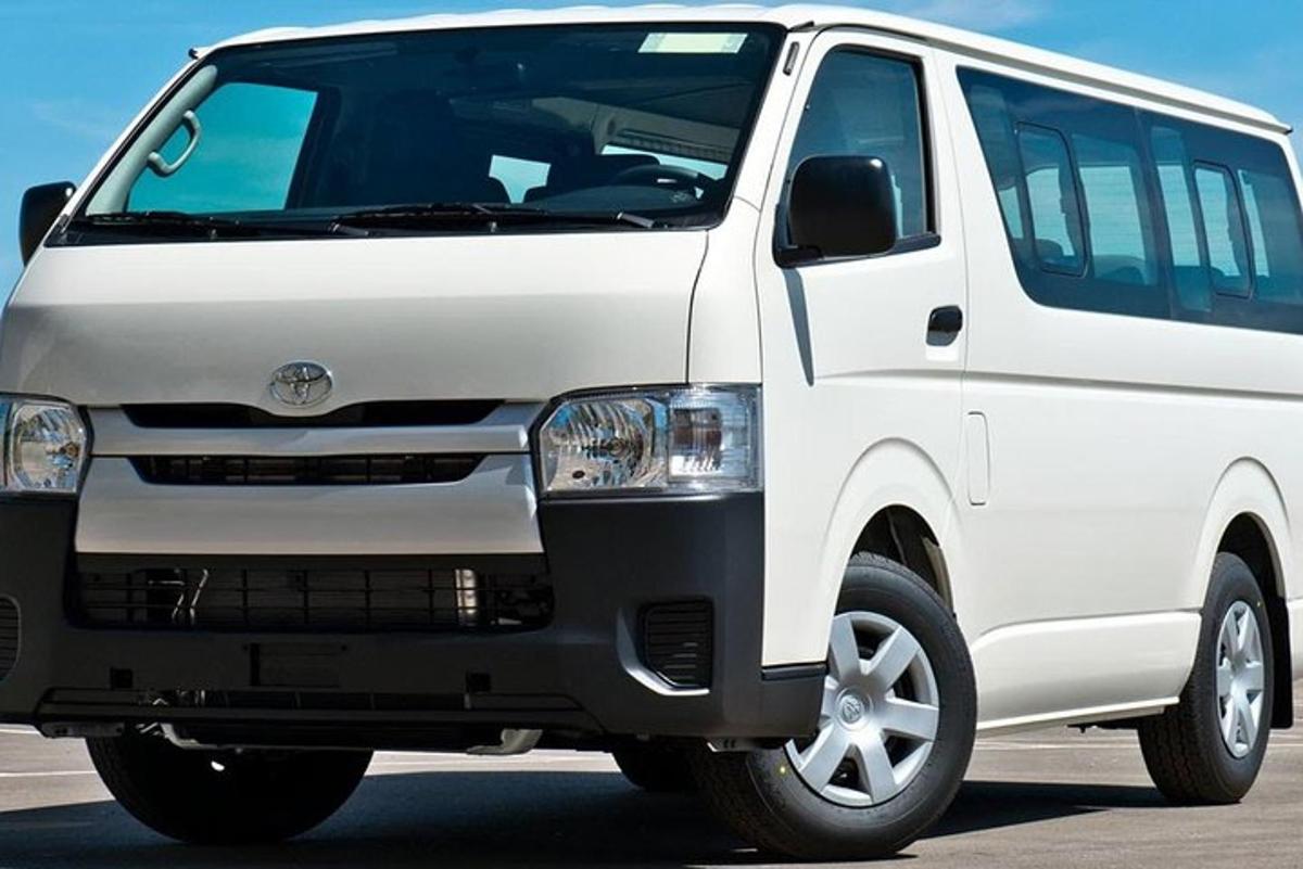 a white van parked in a parking lot